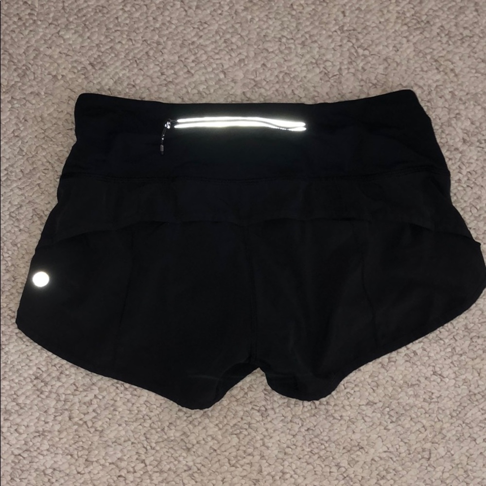 BLACK LULULEMON SHORTS.